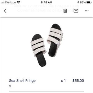 Rothy’s Sea Shell Fringe sandals, size 9, white.